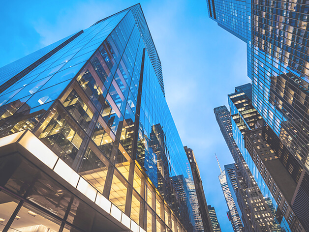 Downtown city buildings with blue sky background