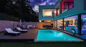 Modern villa with colored led lights at night