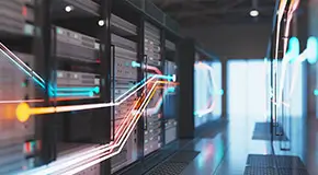 A server room with a digital current overlayed and running to one of the consoles