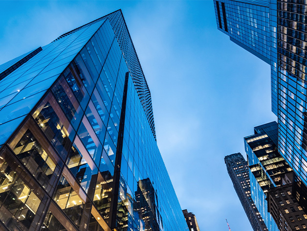 Downtown city buildings with blue sky background