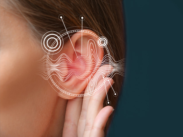 Woman putting her hand to her ear trying to listen